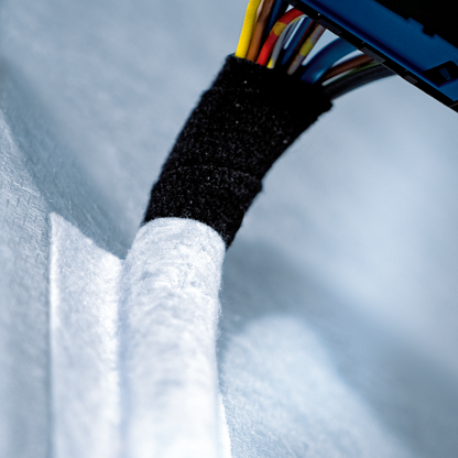 tesa® 50118PV2 540 µm modified acrylic adhesive with PET fleece backing for mounting application in automotive interiors - automotive cable-mounting-004.png