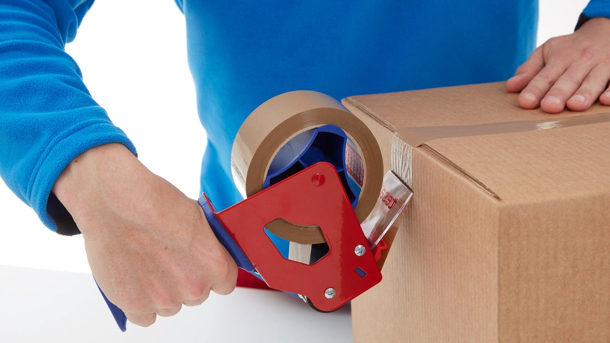 tesa® 4124 Premium Carton Sealing Tape - tesa-4124-premium-carton-sealing-tape-brown-step5of6-ap.jpg