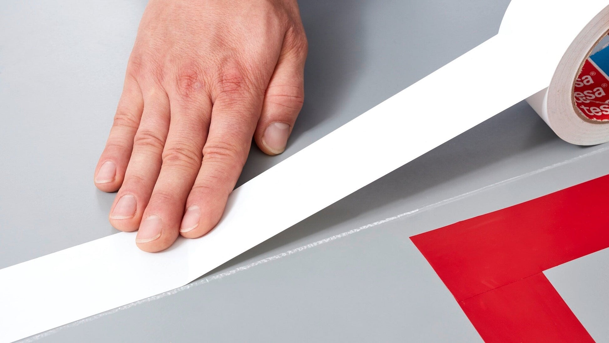 tesa® 4169 Premium Soft PVC Floor Marking Tape - tesa-4169-premium-soft-pvc-floor-marking-tape-white-step2of5-ap.jpg