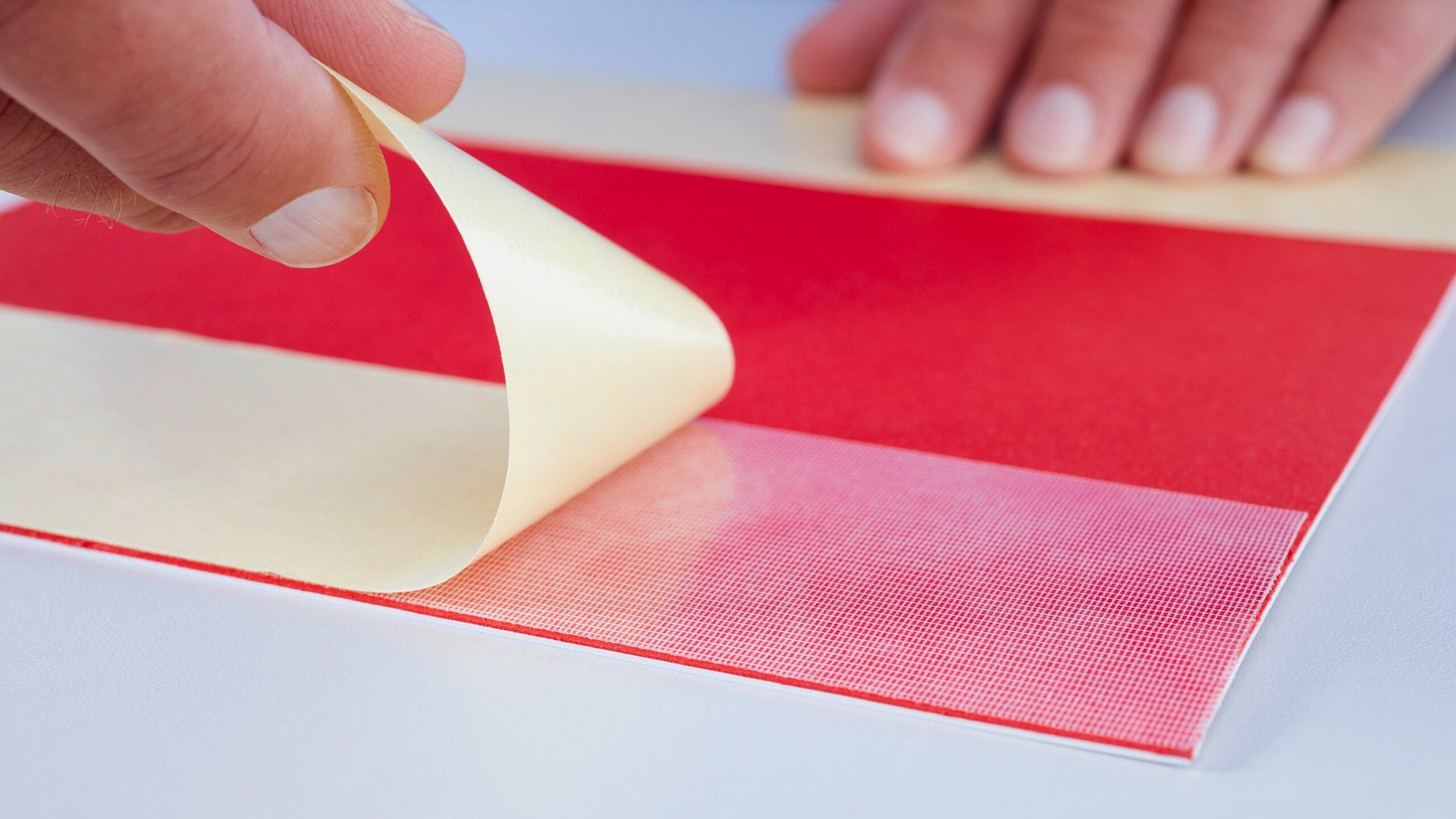 tesa® 4939 tesa® 4939 Removable d/s PET-cloth Tape - tesa-4939-double-sided-removable-pet-cloth-tape-step2of4.jpg