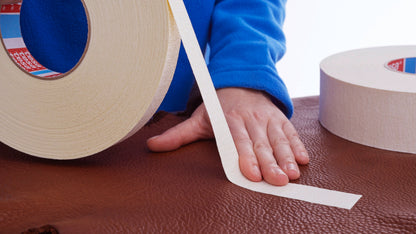 tesa® 4974 Double-sided tape with fabric backing - tesa-4974-double-sided-tape-fabric-backing-smooth-leather-step1of2-002.jpg